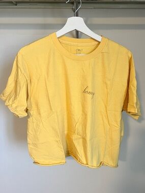 Brandy Melville Yellow 'honey' Graphic Tee